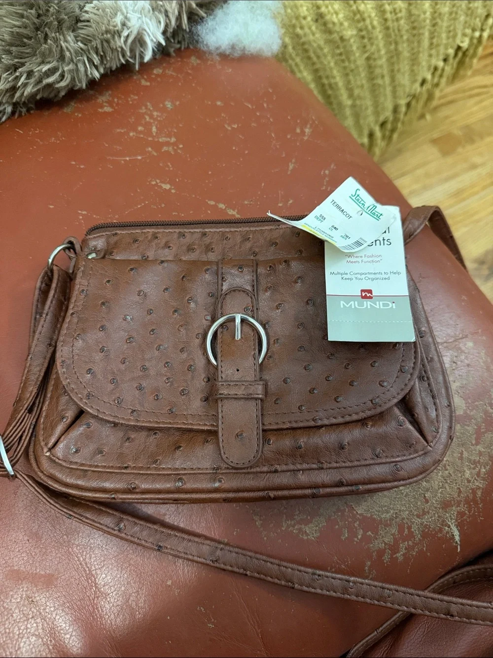 Mundi Brown Textured Crossbody with Buckle Accent